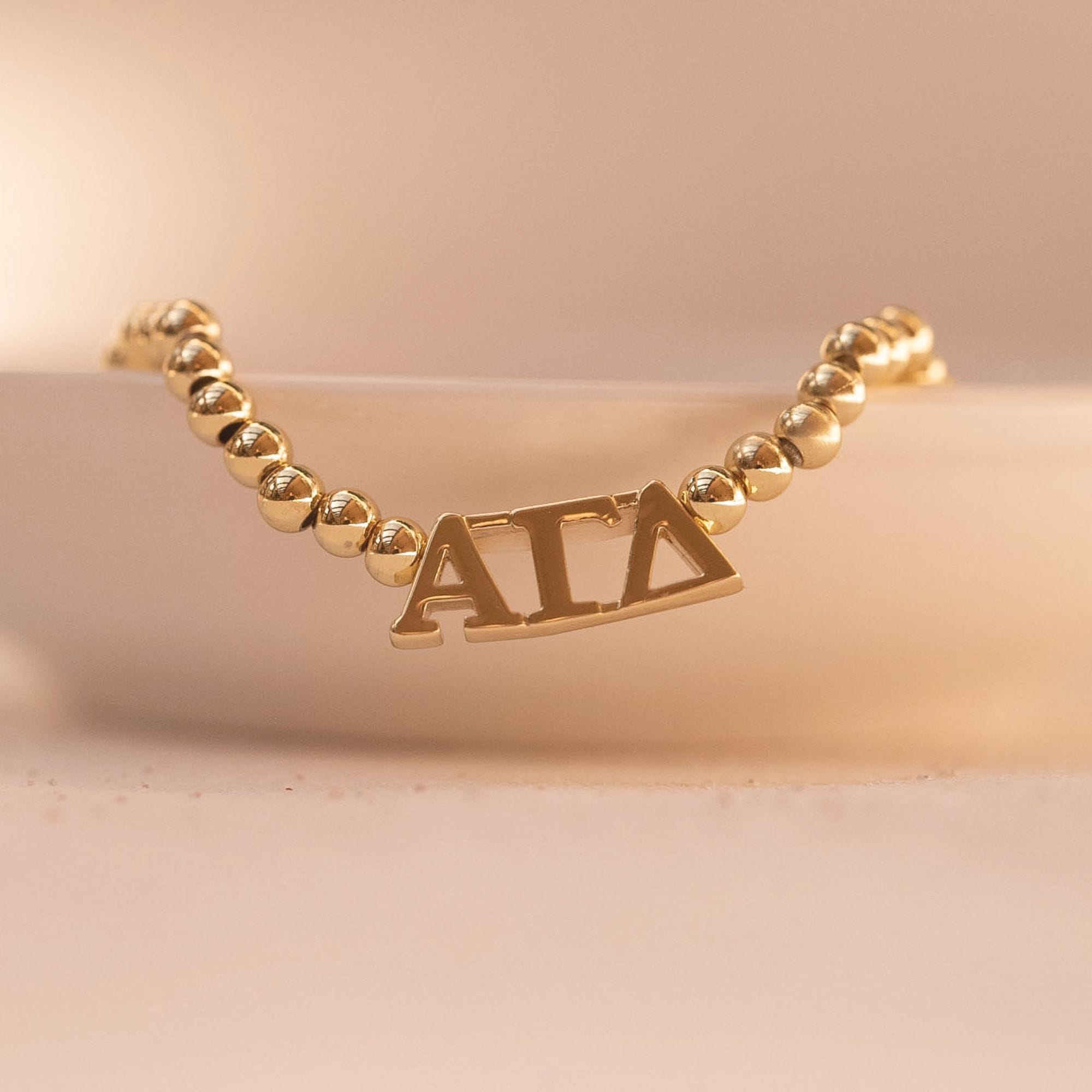 Alpha Gamma Delta Gold Beaded Bracelet