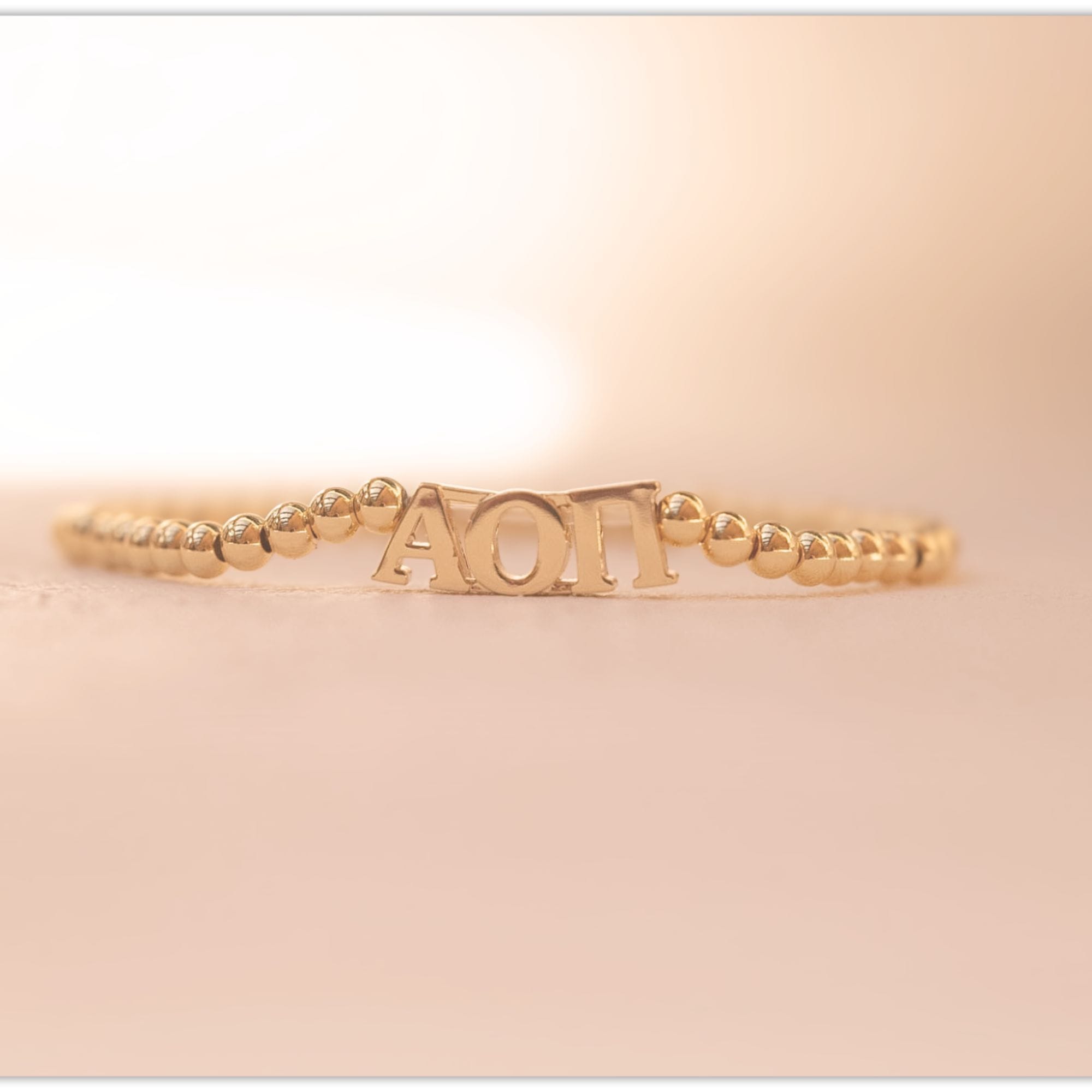 Alpha Omicron Pi Gold Beaded Bracelet