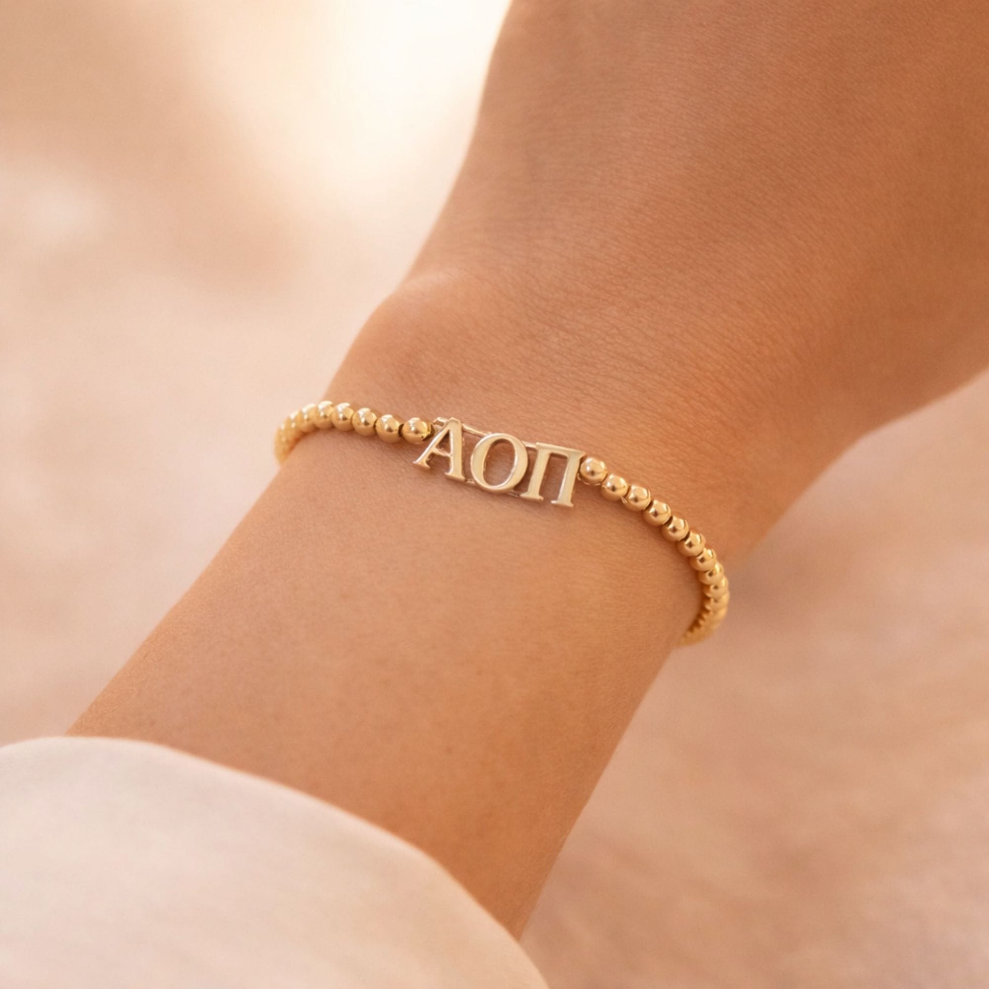Alpha Omicron Pi Gold Beaded Bracelet