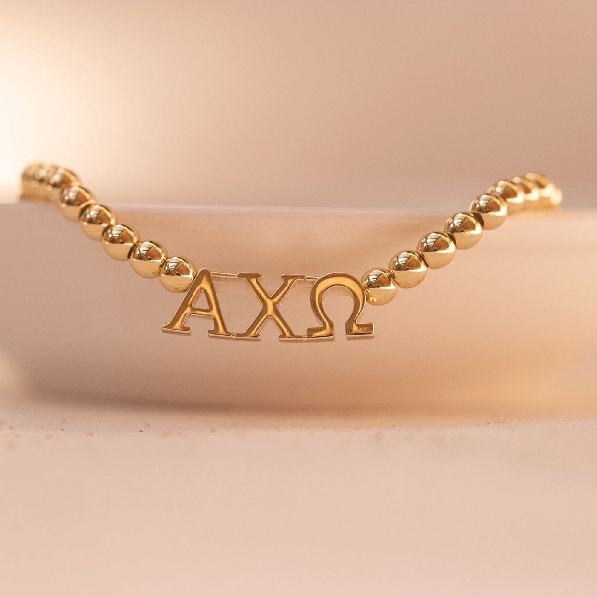 Alpha Chi Omega Gold Beaded Bracelet