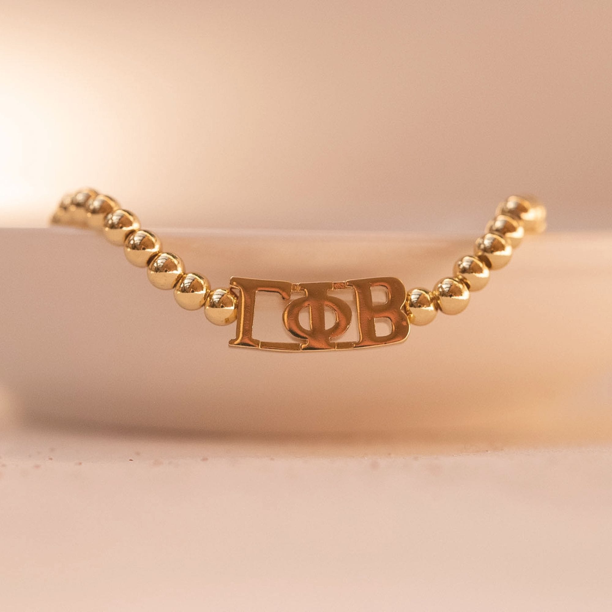 Gamma Phi Beta Gold Beaded Bracelet