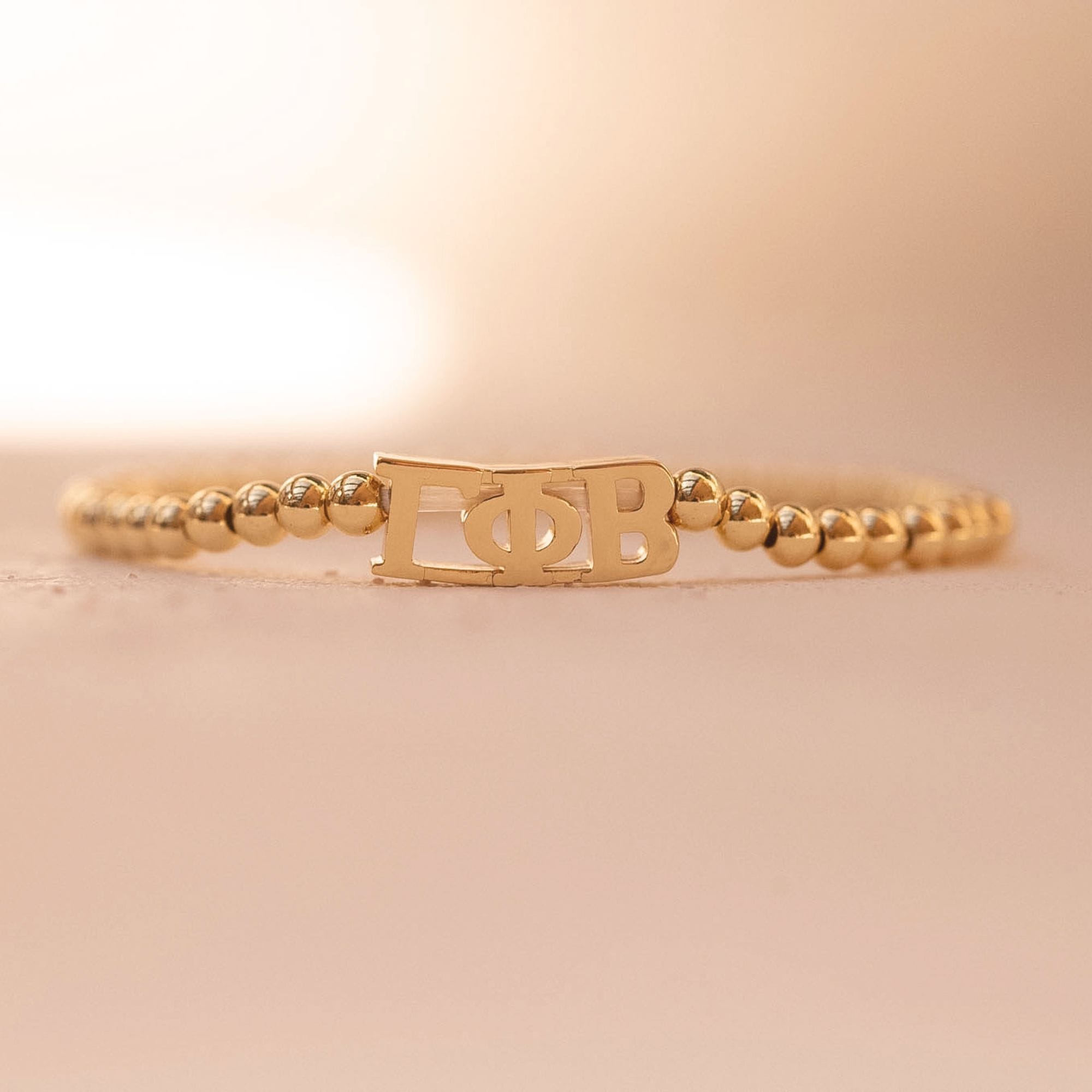 Gamma Phi Beta Gold Beaded Bracelet