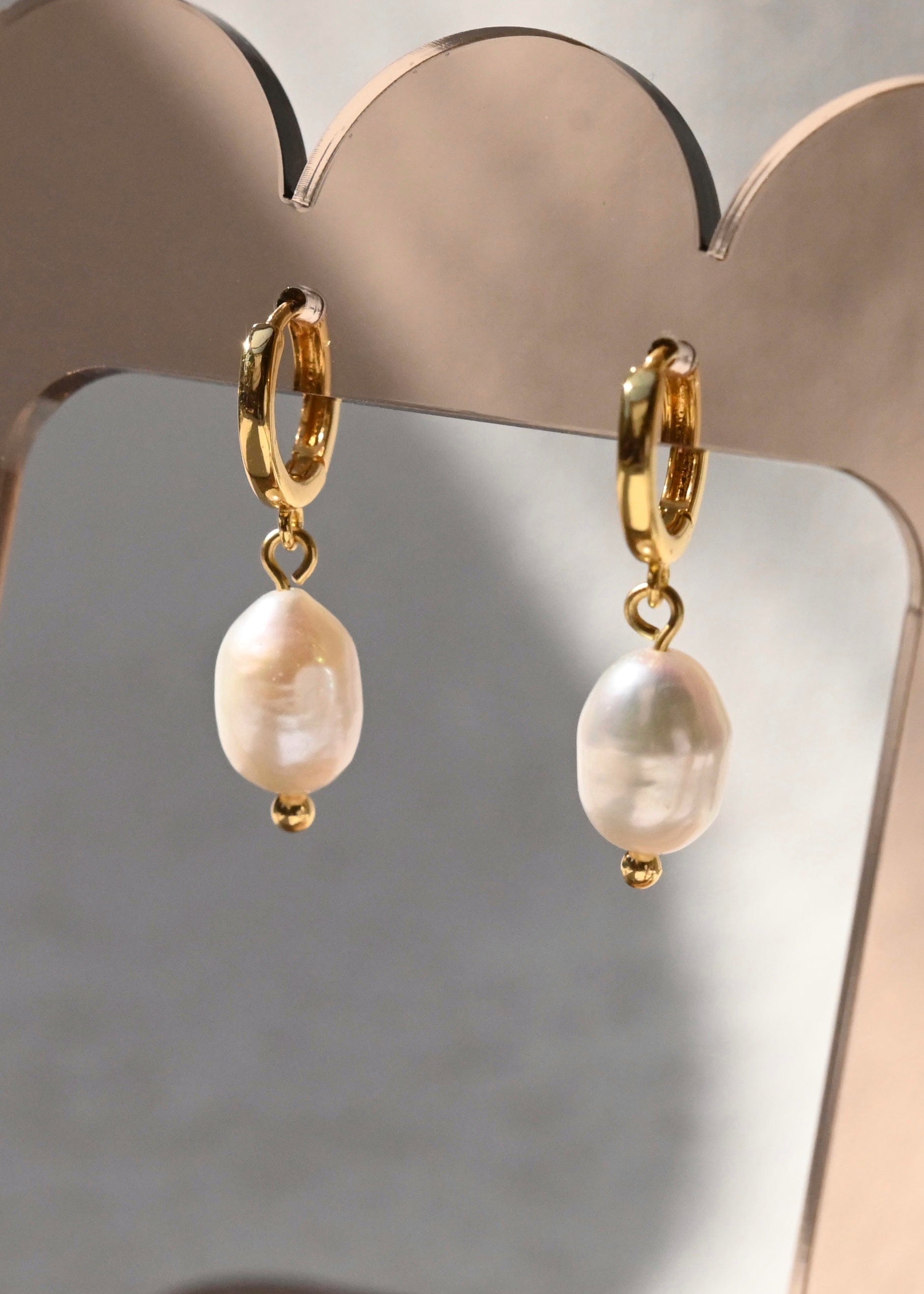 pearl and plated gold drop huggie style earrings