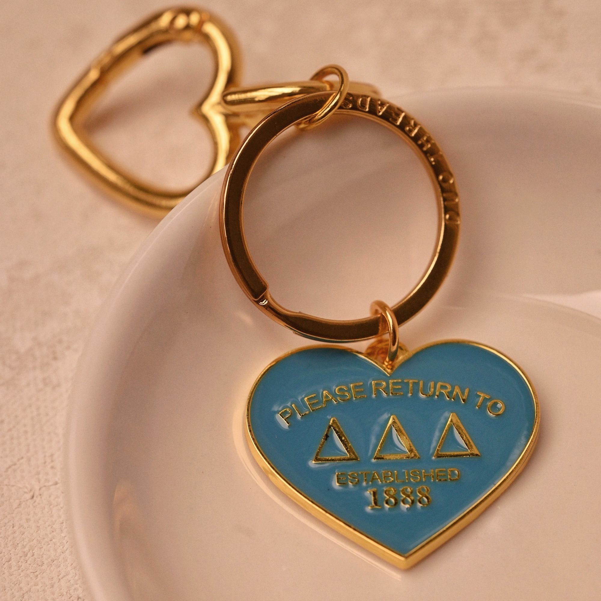 Return to Delta Delta Delta Keychain